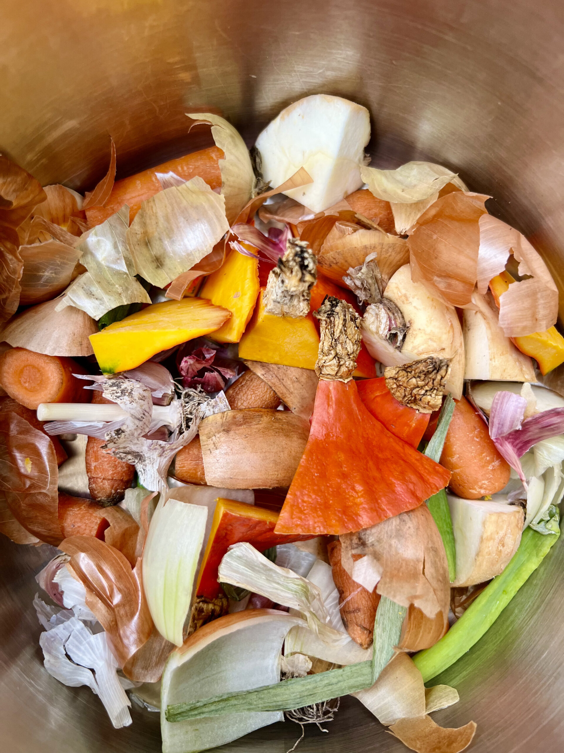 Cut veggie waste in pot