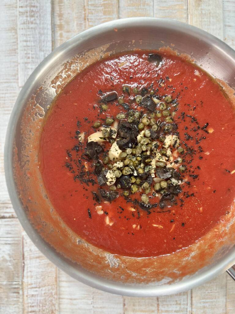 Passata and other ingredients together in a saucepan