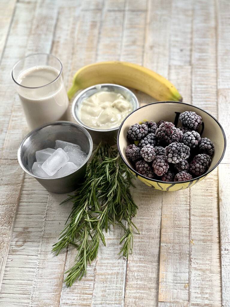 Ingredients for blackberry smoothie in little bowls a wooden  underground