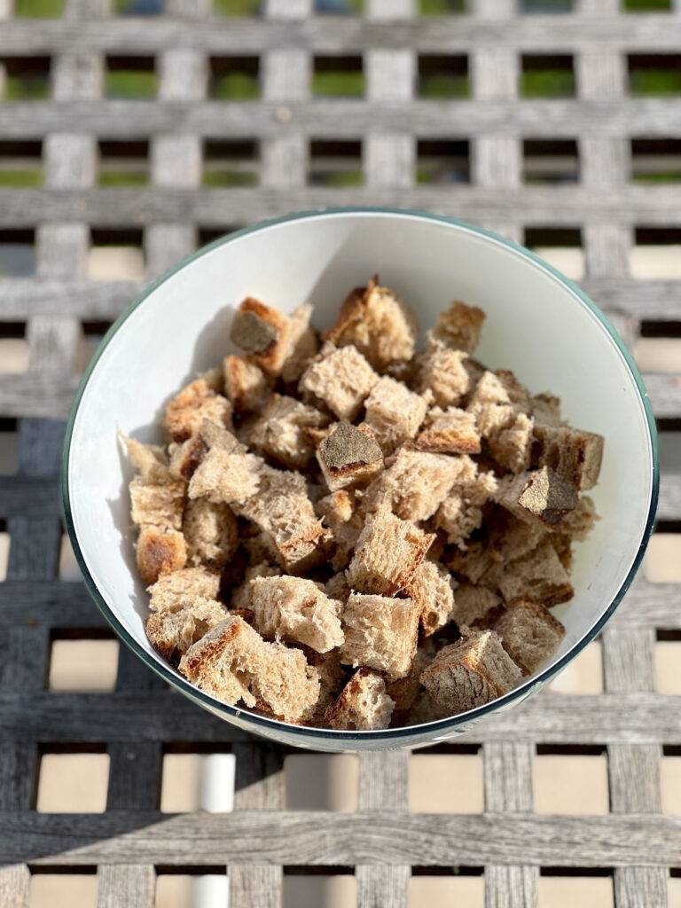 Bread cubes in a white bowl