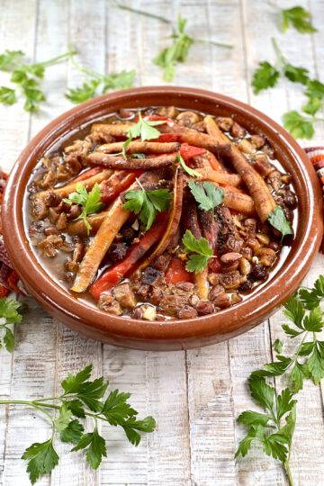 Vegan Tagine garnished with parsley hot and steaming