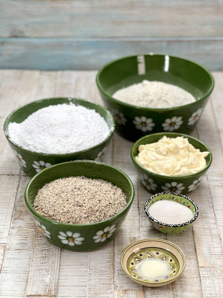 Ingredients for vegan Vanillekipferl in green ceramic bowls