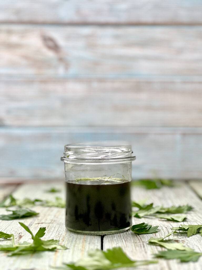 Parsley herb oil in jar