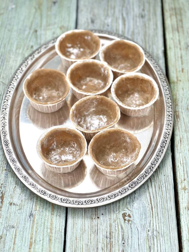 Tart forms on a silver tray