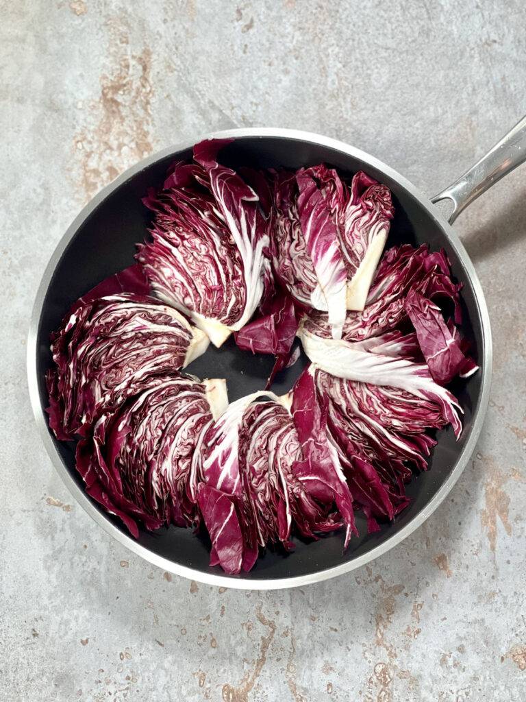 Wedges of sliced radicchio in a non stick pan