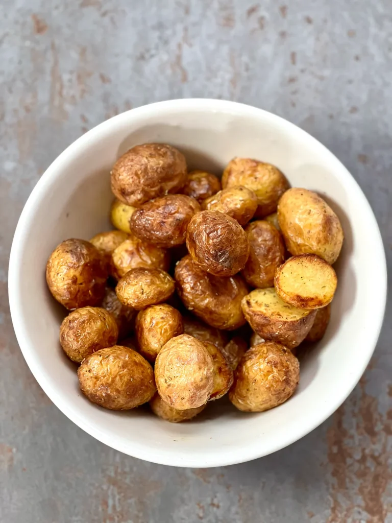 A close up of deliciously crispy golden potatoes