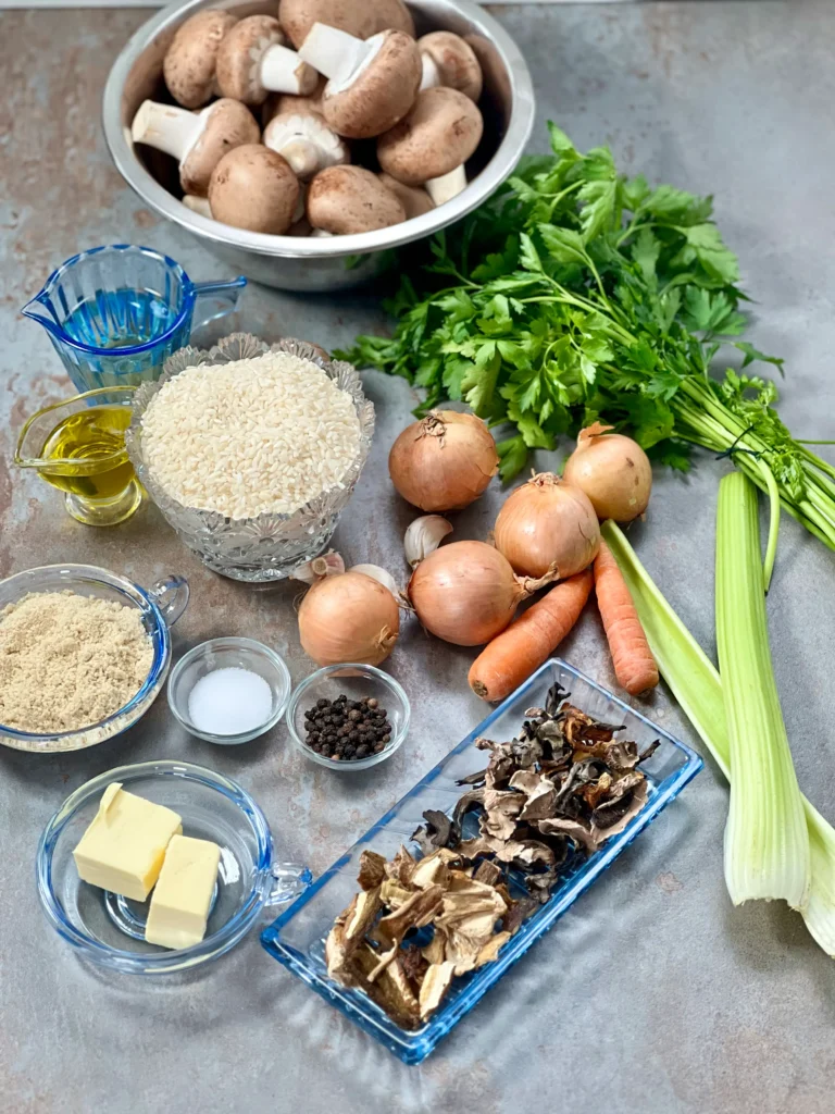 Ingredients for making vegan mushroom risotto beautifully displayed