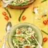 Easy One-Pot Pasta with Asparagus and Cherry Tomatoes is served on plate.