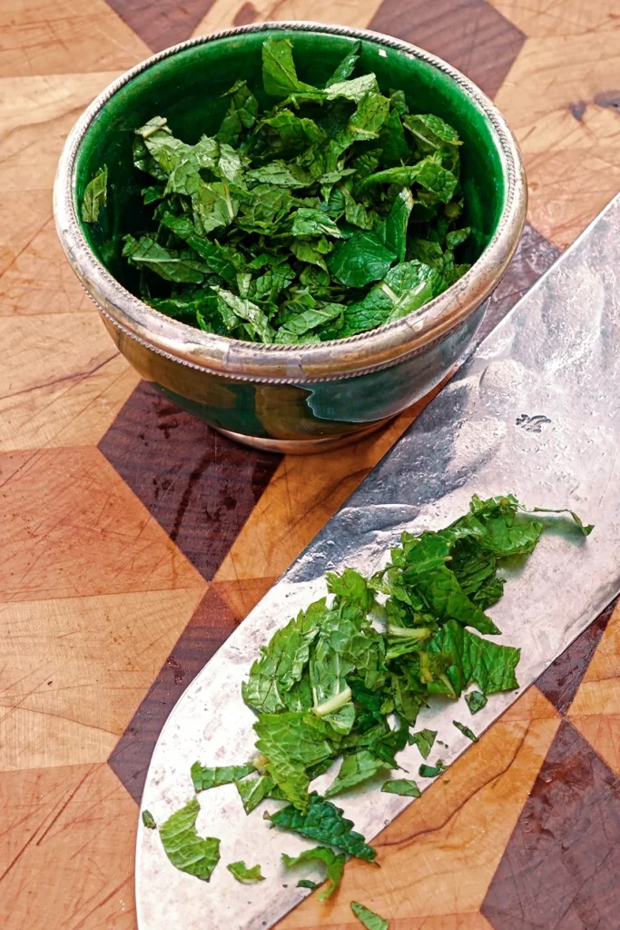 A bowl of chopped fresh mint.