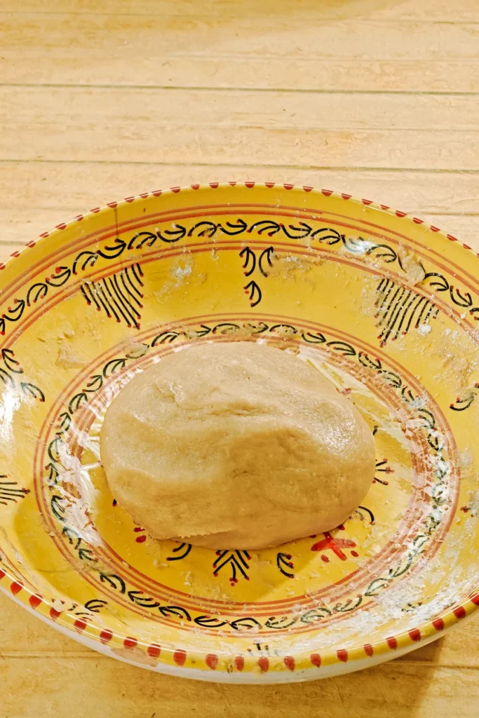 The kneaded sesame cookie dough is in a bowl.